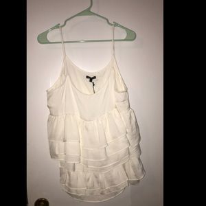 White ruffled tank